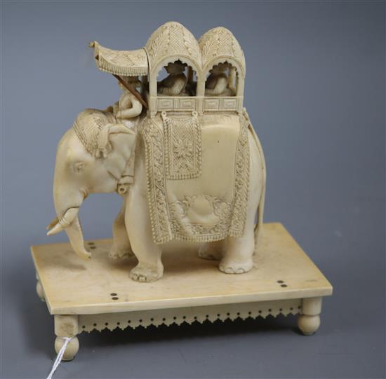 A 19th century Indian Company School ivory carving of an elephant and howdah width 13cm height 14cm